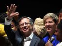 Newly elected Colombian President Gustavo Petro, centre, celebrates next to his wife Veronica Alcocer and his running mate Francia Marquez in Bogota, on Sunday after winning the presidential runoff election. Petro has said he wants to halt auctions of new oil and gas exploration blocks.