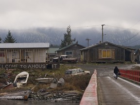 A woman walks in Ahousaht in British Columbia. The National Indigenous Economic Strategy aims to create more opportunities for Indigenous people and their communities.