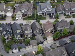 Houses are seen in an aerial view in Langley, B.C., on Wednesday May 16, 2018.