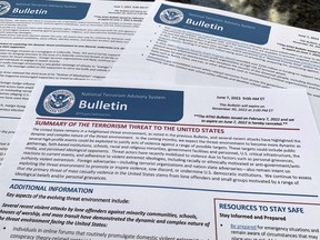 The bulletin issued by the Department of Homeland Security, outlining the current terrorism threat to the United States, is photographed Thursday, June 9, 2022. DHS warned June 7 that skewed framing of the subjects like abortion, guns, immigration and LGTBQ rights, could drive extremists to violently attack pubic places across the U.S. in the coming months.