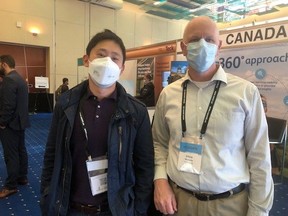 Dr. Leung receiving his award from Steve Reinecke at the Vancouver AMMI Conference in April.