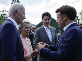 From left, U.S. President Joe Biden, European Commission President Ursula von der Leyen, Canada's Prime Minister Justin Trudeau and Emmanuel Macron, Prime Minister of France talk as they attend a family photo opportunity at Castle Elmau in Kruen, near Garmisch-Partenkirchen, Germany, on Sunday, June 26, 2022. The Group of Seven leading economic powers are meeting in Germany for their annual gathering Sunday through Tuesday.