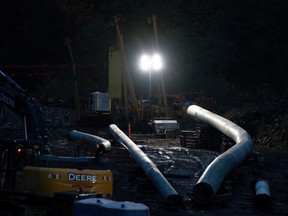 Construction of the Trans Mountain Pipeline is pictured near Hope, B.C., Monday, Oct. 18, 2021. The Parliamentary Budget Officer says the federal government now stands to lose money from its investment in the Trans Mountain pipeline.