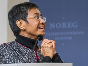 FILE - Nobel Peace Prize laureate Maria Ressa, from the Philippines, attends a news conference in Oslo, Saturday, Dec. 11, 2021. Ressa announced in a speech in Hawaii, Tuesday, June 28, 2022, that the Philippine government is affirming a previous order to shut down Rappler, the news website she co-founded, which has gained notoriety for its reporting of President Rodrigo Duterte's bloody crackdown on illegal drugs.