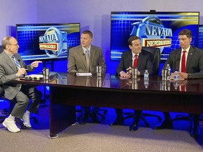 FILE - Republican Senate hopefuls Sam Brown, right, and Adam Laxalt, second from right, prepare for a debate taped for broadcast this week on "Nevada Newsmakers" on May 9, 2022, at a television studio in Reno, Nev. Republicans are pushing an anti-Big Tech message in the midterm campaigns as they look to tap into the resentment toward large technology companies that increasingly courses through their party.