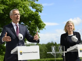 Sweden's Prime Minister Magdalena Andersson, right, and NATO Secretary General Jens Stoltenberg attend a joint press conference at Harpsund, the country retreat of Swedish prime ministers, in Sodermanland County, Sweden, Monday, June 13, 2022.