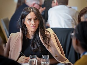 Meghan, the Duchess of Sussex, wearing an Aritzia coat in 2019.