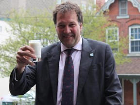 A photo published on the Dairy Farmers of Canada (DFC) website shows DFC president Pierre Lampron raising a glass of milk in celebration of World Milk Day on June 1.