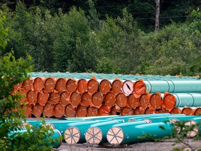 Pieces of the Trans Mountain Pipeline project sit in a storage lot outside of Hope, B.C.