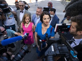 Sarah Ransome, an alleged victim of Jeffrey Epstein and Ghislaine Maxwell, right, alongside Elizabeth Stein, left, speak to members of the media outside federal court, Tuesday, June 28, 2022, in New York. Ghislaine Maxwell, the jet-setting socialite who once consorted with royals, presidents and billionaires, was set to be sentenced Tuesday for helping the wealthy financier Jeffrey Epstein sexually abuse underage girls.