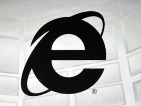 FILE - The Microsoft Internet Explorer logo is projected on a screen during a Microsoft Xbox E3 media briefing in Los Angeles, June 4, 2012. As of Wednesday, June 15, 2022, Microsoft will no longer support the once-dominant browser that legions of web surfers loved to hate and a few still claim to adore.