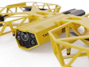 This photo provided by Axon Enterprise depicts a conceptual design through a computer-generated rendering of a taser drone. Taser developer Axon says it is working to build drones armed with the electric stunning weapons that could fly in schools and "help prevent the next Uvalde, Sandy Hook, or Columbine." But its own technology advisers quickly panned the idea as a dangerous fantasy. (Axon Enterprise, Inc. via AP)