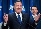 The government of Quebec Premier Francois Legault, left, faces a lawsuit for its legislation — Bill 21 — described as an act “to end petroleum exploration and production.”