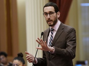 FILE - California state Sen. Scott Wiener, D-San Francisco, speaks on a measure at the Capitol in Sacramento, Calif., on March 31, 2022. Nine months after it passed the Legislature, California lawmakers are finally sending Gov. Gavin Newsom a bill that would bar police from making arrests on a charge of loitering for prostitution. Sen. Wiener took the unusual step of holding his bill until Monday, June 20, 2022. It passed the Assembly in September with no votes to spare.