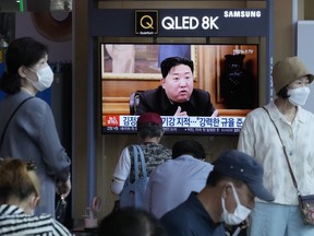 People watch a TV showing an image of North Korea leader Kim Jong Un during a news program at the Seoul Railway Station in Seoul, South Korea, Monday, June 13, 2022. Kim and his top deputies have pushed for a crackdown on officials who abuse their power and commit other "unsound and non-revolutionary acts," state media reported Monday, as Kim seeks greater internal unity to overcome a COVID-19 outbreak and economic difficulties.