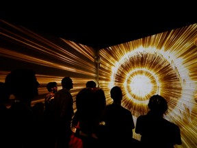 Attendees at a tech conference. Innovators are working on things that will make the world better, writes Tom Bradley.
