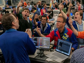 Traders work on the new floor of The Chicago Board Of Options Exchange. North American equities rebounded at the opening of trade Tuesday.