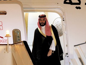 Saudi Crown Prince Mohammed bin Salman disembarks off his aircraft upon arrival at Queen Alia International Airport on the southern outskirts of Jordan's capital Amman on June 21, 2022.  Photographer: Khalil Mazraawi/AFP/Getty Images