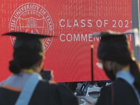 FILE - Graduates of the University of Texas Rio Grande Valley attend their commencement ceremony at the schools parking lot on Friday, May 7, 2021, in Edinburg, Texas. Buy now, pay later financing options are increasingly being offered by for-profit credentialing schools and boot camps. The "learn now, pay later" concept is appealing, and students are already familiar with the name brand companies since buy now, pay later is ubiquitous within online retail.