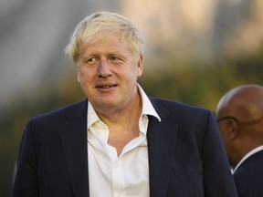 British Prime Minister Boris Johnson waits for the start of a group photo at the G7 summit at Castle Elmau in Kruen, near Garmisch-Partenkirchen, Germany, on Sunday, June 26, 2022. The Group of Seven leading economic powers are meeting in Germany for their annual gathering Sunday through Tuesday.