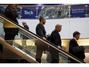 Attendees ride escalators past Teck Resources Ltd. signage during the Prospectors & Developers Association of Canada (PDAC) conference in Toronto, Ontario, Canada, on Monday, March 2, 2020. While other big conferences have been canceled, including the CERAWEEK summit in Houston which was due to start on March 9, miners declared last week that the show would go on despite the coronavirus -- with vigorous sanitation protocols in place.