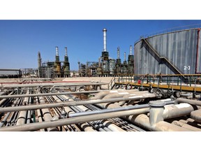 Refining towers and fuel storage tanks are seen at the Zawiya oil refinery near Tripoli, Libya.