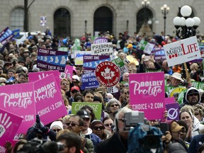 A group of prominent women in Canada's tech sector are calling for employers of U.S. workers to pay for staff to travel to get abortions. People take part in the March For Life rally on Parliament Hill in Ottawa on Thursday, May 9, 2019.