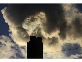 Vapour rises from a chimney at the Drax Power Station, operated by Drax Group Plc, in Selby, U.K., on Tuesday, March 11, 2014.