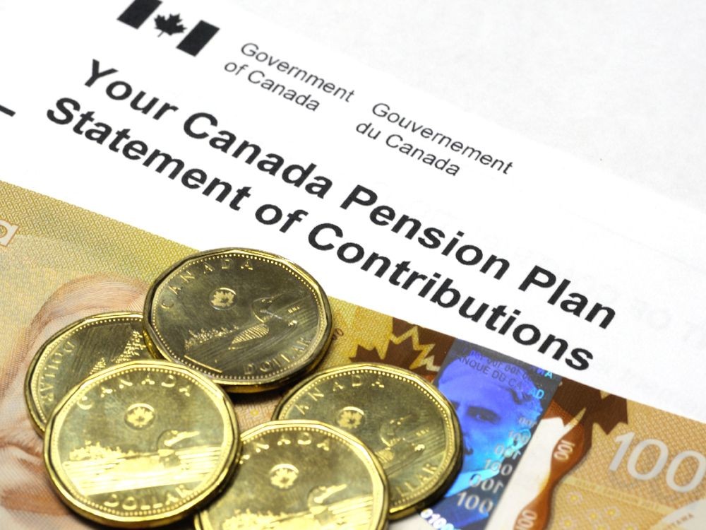 A Canada Pension Plan Statement of Contributions with a 100 dollar banknote and dollar coins. getty
