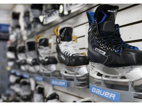 Bauer hockey skates are displayed for sale at an equipment store in Toronto, Ontario, Canada, on Monday, Oct. 31, 2016. Performance Sports Group Ltd., the owner of the Bauer and Easton brands, filed for bankruptcy protection as part of a deal to sell the hockey- and baseball-equipment business for at least $575 million. Photographer: Cole Burston/Bloomberg