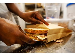 A chef prepares a toasted sandwich in the kitchen of a branch of food retailer Pret a Manger Ltd. in London, U.K., on Monday, March 27, 2017. Food chain Pret a Manger said it's concerned about Brexit because just one in 50 applicants seeking jobs is British.