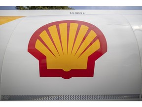 The Shell logo sits on a tanker truck during a fuel delivery at a gas station, operated by Royal Dutch Shell Plc., in Rotterdam, Netherlands, on Wednesday, July 25, 2018. Shell is scheduled to release earnings figures on July 26. Photographer: Jasper Juinen/Bloomberg
