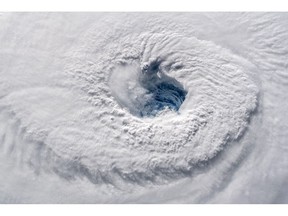 IN SPACE - SEPTEMBER 12: In this satellite image provided by the National Aeronatics and Space Administration (NASA) and European Space Agency (ESA), Hurricane Florence churns through the Atlantic Ocean toward the U.S. East Coast on September 12, 2018. Florence slowed its approach to the U.S. today and was expected to turn south, stalling along the North Carolina and South Carolina coast and bringing with it torrential rain, high winds and a dangerous storm surge tomorrow through Saturday. The image was captured by ESA astronaut Alexander Gerst, currently living and working onboard the International Space Station.