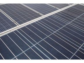 Photovoltaic panels stand on the roof of Irex Energy JSC's manufacturing facility in Vung Tau, Vietnam, on Monday, July 15, 2019. After U.S. President Donald Trump slapped higher tariffs on China, production in neighboring Vietnam went into overdrive. Chinese manufacturers, who face a 55% U.S. tariff on their goods, relocated some production to Vietnam, while local businesses saw a jump in orders. In June alone, U.S. imports of solar cells from Vietnam surged 656% from a year ago. Photographer: Yen Duong/Bloomberg