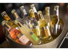 Bottles of tonic water sit in an ice bucket at the Fevertree Drinks Plc Gin and Tonic bar during the annual Cowes Week sailing regatta near Cowes on the Isle of Wight, U.K. on Tuesday, Aug. 13, 2019. A cool start to summer contributed to U.K. sales rising just 5% in the opening six months of the year, an outcome that disappointed most analysts, particularly in light of the stellar growth rates of recent years.