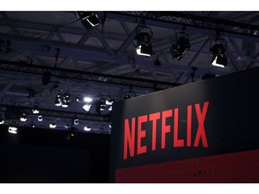 A Netflix Inc. logo sits on the online television streaming company's exhibition area at the Gamescom gaming industry event in Cologne, Germany, on Tuesday, Aug. 20, 2019. Gamescom is the world's largest gaming convention and runs from August 20 to 24.