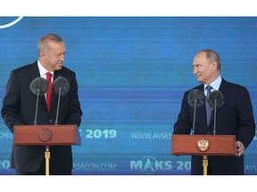 Recep Tayyip Erdogan, Turkey's president, left, and Vladimir Putin, Russia's president, attend a news conference at the MAKS International Aviation and Space Salon at Zhukovsky International Airport in Moscow, Russia, on Tuesday, Aug. 27, 2019. The Kremlin hinted at possible talks over new arms deals between Putin and Erdogan when the two leaders meet at the international air show near Moscow.