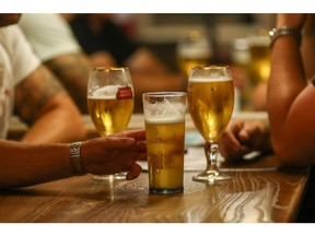 Pints of beer sit on a table at The Moon Under Water pub, operated by J D Wetherspoon Plc, on Leicester Square in London, U.K., on Saturday, July 4, 2020. Restaurants, hotels, cinemas and hairdressers will also be allowed to open their doors again on what has been dubbed 'Super Saturday' after 3 1/2 months of an economic lockdown brought in to contain the outbreak.