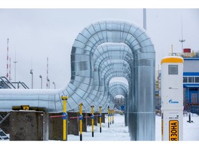 A branded marker post alongside pipework at the Gazprom PJSC Slavyanskaya compressor station, the starting point of the Nord Stream 2 gas pipeline, in Ust-Luga, Russia, on Thursday, Jan. 28, 2021. Nord Stream 2 is a 1,230-kilometer (764-mile) gas pipeline that will double the capacity of the existing undersea route from Russian fields to Europe -- the original Nord Stream -- which opened in 2011.