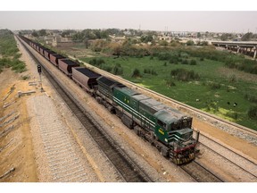 A freight train transports coal on the outskirts of Hyderabad, Pakistan, on Thursday, March 18, 2021. Pakistan last month reached an agreement with the International Monetary Fund on resumption of a $6 billion bailout program, paving the way for fund inflows that will bolster economic stability and help the South Asian nation easily see through its bond sale plan. Photographer: Asim Hafeez/Bloomberg