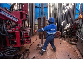 A worker fits drilling pipes at the Gazprom PJSC gas drilling rig in the Kovyktinskoye gas field, part of the Power of Siberia gas pipeline project, near Irkutsk, Russia, on Wednesday, April 7, 2021. Built by Russian energy giant Gazprom PJSC, the pipeline runs about 3,000 kilometers (1,864 miles) from the Chayandinskoye and Kovyktinskoye gas fields in the coldest part of Siberia to Blagoveshchensk, near the Chinese border.
