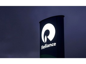 Reliance Industries Ltd. signage at a gas station near the company's oil refinery in Jamnagar, Gujarat, India. Photographer: Dhiraj Singh/Bloomberg