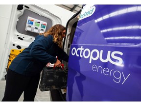 An employee loads a van with tools at the Octopus Energy Ltd.'s training and R&D centre in Slough, U.K., on Tuesday, Sept. 28, 2021. Octopus, backed by Al Gore's sustainability fund, is helping teach the plumbers to install heat pumps that will play a pivotal role in the U.K.'s strategy to have net-zero emissions by 2050. Photographer: Chris Ratcliffe/Bloomberg