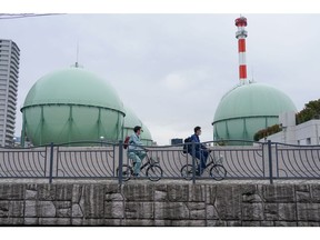 Japan could ask people to reduce their natural gas consumption 2 Cyclists pass Tokyo Gas Co. storage tanks at the company's Hiranuma plant in Yokohama, Japan, Wednesday, April 20, 2022. Japanese imports jumped 31 percent in March from a year ago year to reach a record value, driven by crude oil, coal and natural gas, and this will result in higher electricity bills in the country which is heavily dependent on others for its energy resources. Photographer: Toru Hanai/Bloomberg
