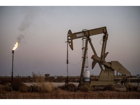 An oil pump jack in Midland, Tex.