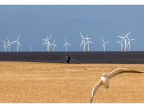 Offshore wind turbines at the Scroby Sands Wind Farm, operated by E.ON SE, near Great Yarmouth, UK, on Friday, May 13, 2022. The UK will introduce new laws for energy to enable a fast build out of renewables and nuclear power stations as set out in the government's energy security strategy last month. Photographer: Chris Ratcliffe/Bloomberg