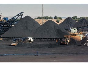 Stockpiles of coal in a storage area at the Kusile coal-fired power station, operated by Eskom Holdings SOC Ltd., in Delmas, Mpumalanga province, South Africa, on Wednesday, June 8, 2022. The coal-fired plant's sixth and last unit is expected to reach commercial operation in two years, with the fifth scheduled to be done by December 2023.