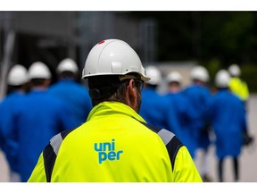 Employees and members during a tour of the Uniper SE Bierwang Natural Gas Storage Facility in Muhldorf, Germany, on Friday, June 10, 2022. Uniper is playing a key role in helping the government set up infrastructure to import liquified natural gas to offset Russian deliveries via pipelines. Photographer: Krisztian Bocsi/Bloomberg