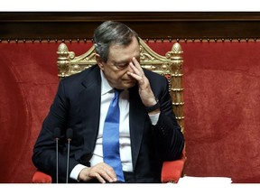 Mario Draghi, Italy's prime minister, listens during a debate at the Senate in Rome, Italy, on Tuesday, June 21, 2022. Italy's biggest party is set to splinter over the country's support for Ukraine, just as Draghi defended in parliament his government's stance on the conflict.