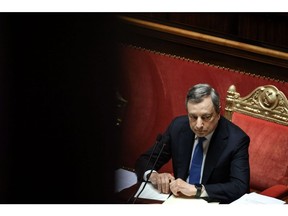 Mario Draghi, Italy's prime minister, listens during a debate at the Senate in Rome, Italy, on Tuesday, June 21, 2022. Italy's biggest party is set to splinter over the country's support for Ukraine, just as Draghi defended in parliament his government's stance on the conflict.